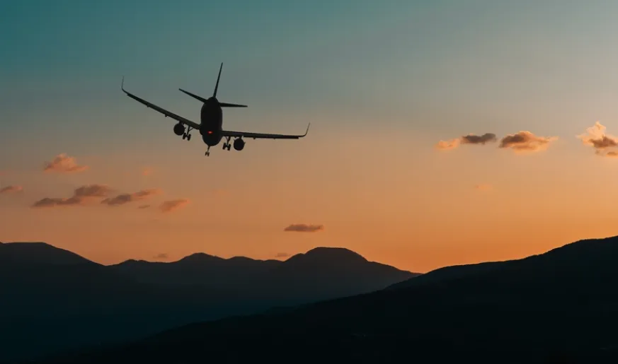 Photo of a commercial airplane preparing for landing.