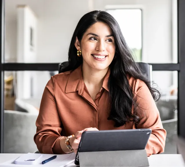 Photo of a women using a tablet