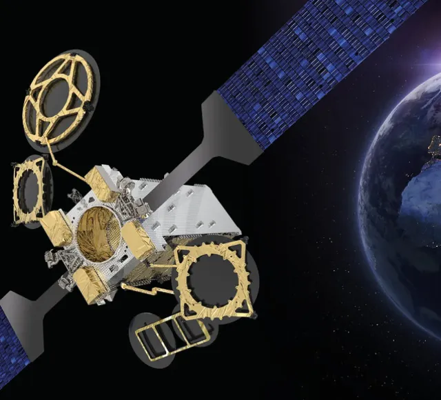 Image of a satellite and the Earth