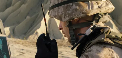 Photo of a soldier using devices