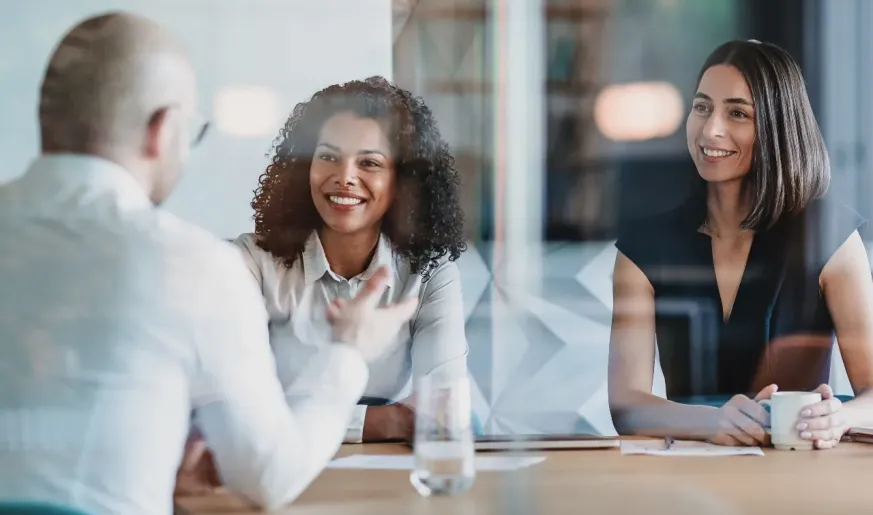 Photo of corporate employees having an office meeting 