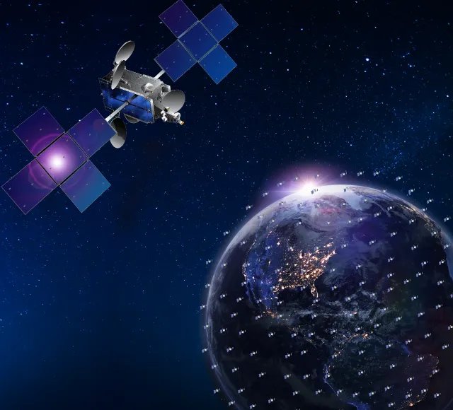 Image of a satellite and the Earth