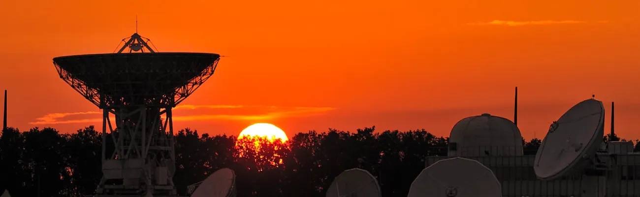 Photo of antennas at sunset