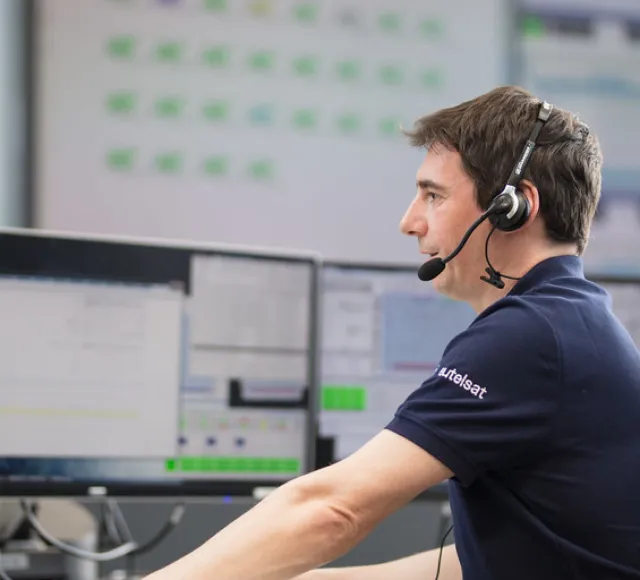 Photo of a support engineer in the control center
