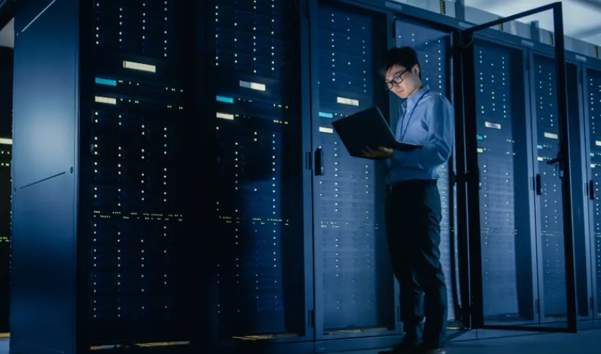 Photo of a man in a data center
