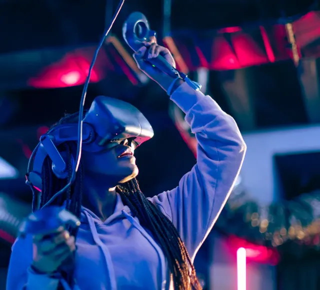 Photo of a woman using digital VR camera for a repair job