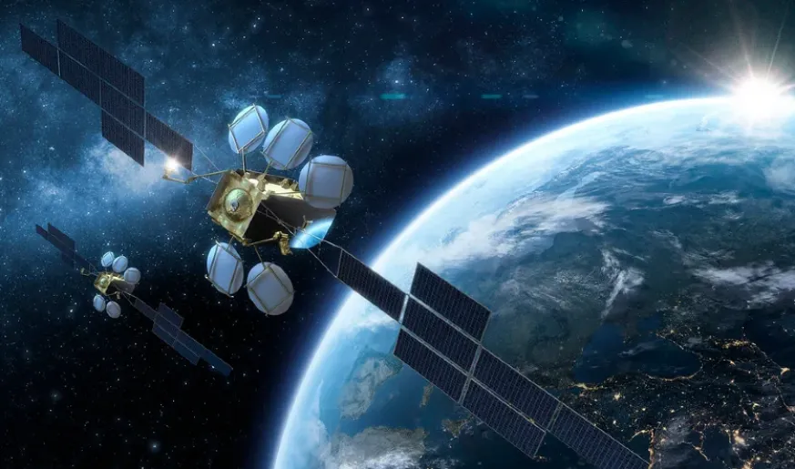 Image of a satellite and the Earth