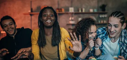 Fast channels hero image of young people watching TV