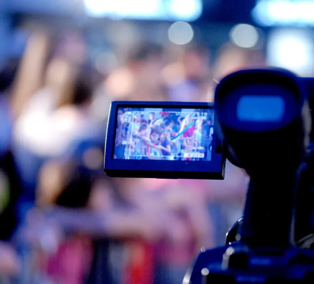 Photo of TV camera filming event