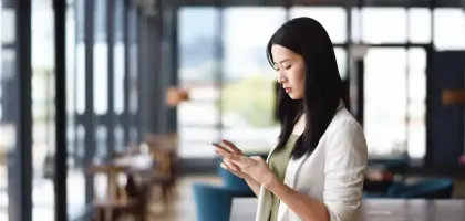 Photo of a woman using her mobile